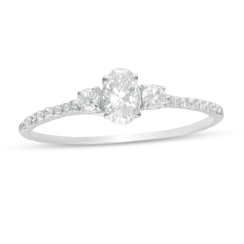 Main Image 1 of 5/8 CT. T.W. Oval and Round Diamond Three Stone Engagement Ring in 14K White Gold