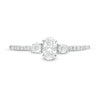 Thumbnail Image 4 of 5/8 CT. T.W. Oval and Round Diamond Three Stone Engagement Ring in 14K White Gold