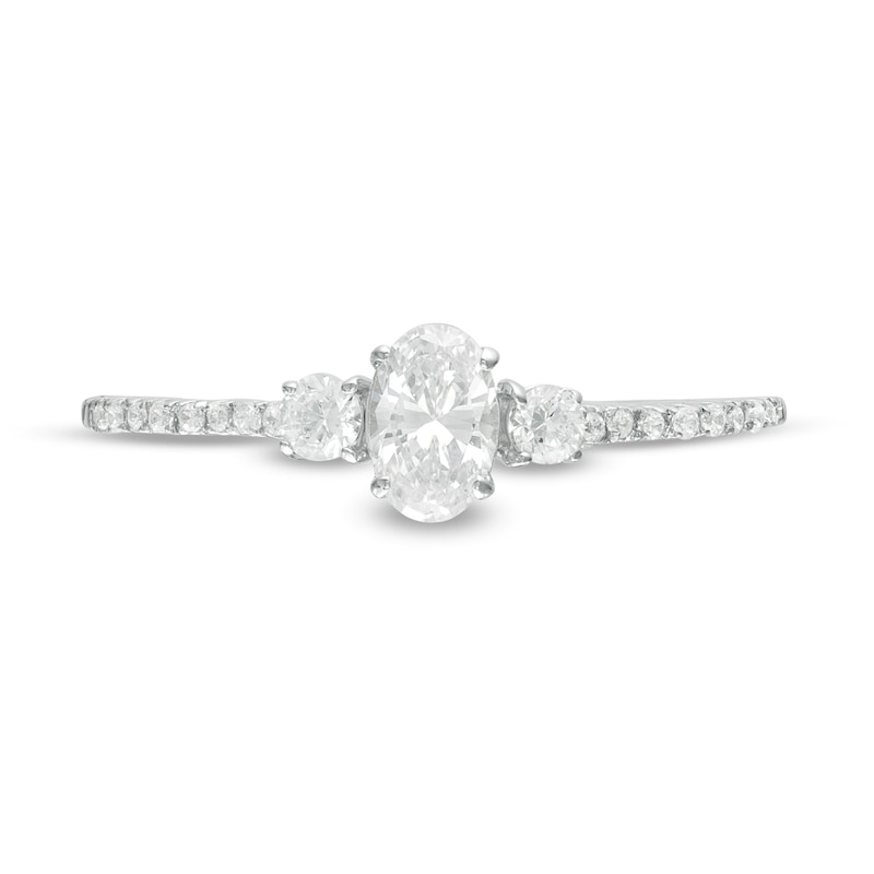Main Image 4 of 5/8 CT. T.W. Oval and Round Diamond Three Stone Engagement Ring in 14K White Gold