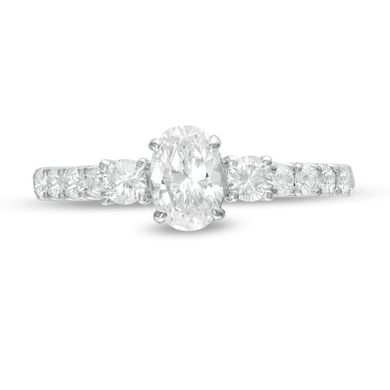 1-1/6 CT. T.w. Diamond Three Stone Engagement Ring in 14K White Gold