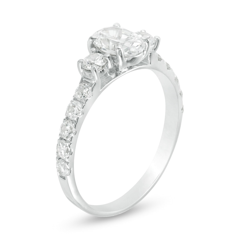 Main Image 3 of 1-1/3 CT. T.W. Oval Diamond Three Stone Engagement Ring in 14K White Gold