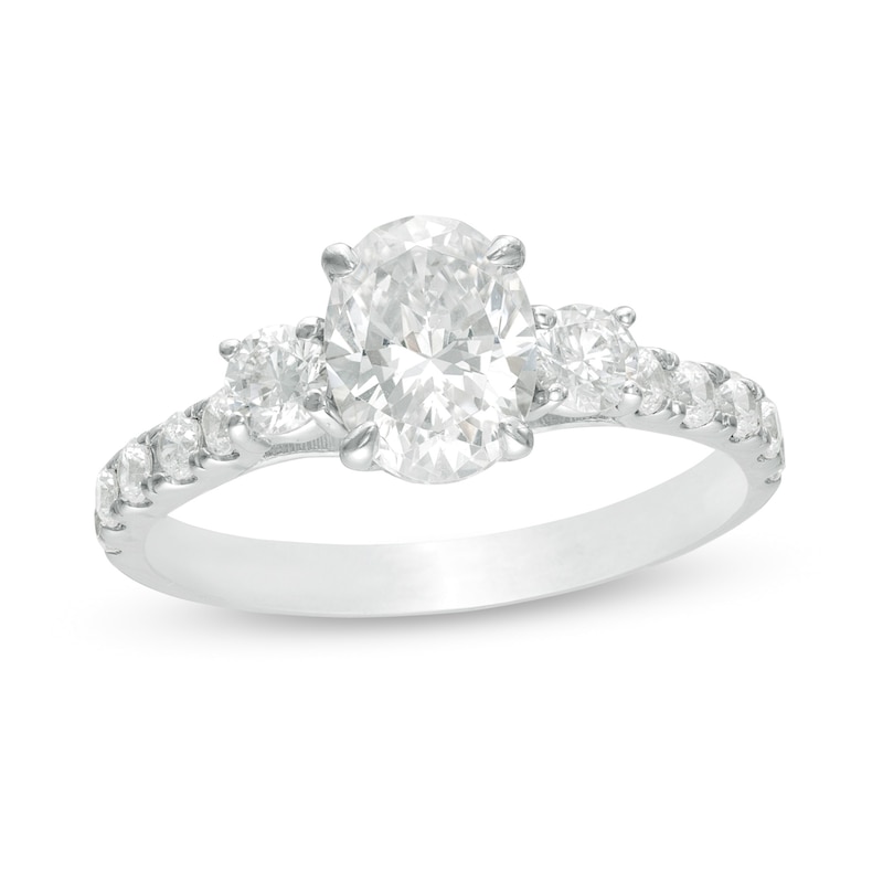 Main Image 1 of 1-3/4 CT. T.W. Oval and Round Diamond Three Stone Engagement Ring in 14K White Gold