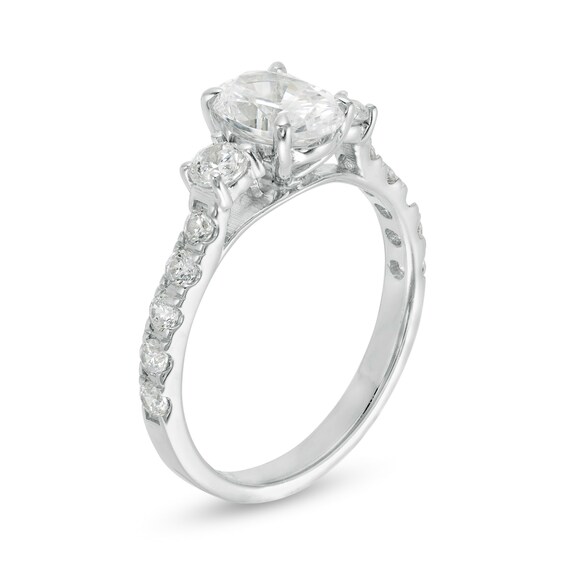1-3/4 CT. T.w. Oval and Round Diamond Three Stone Engagement Ring in 14K White Gold