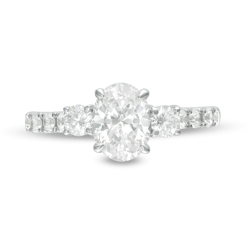 Main Image 4 of 1-3/4 CT. T.W. Oval and Round Diamond Three Stone Engagement Ring in 14K White Gold