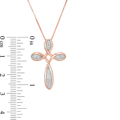 1/8 CT. T.W. Diamond Loop Cross Pendant 