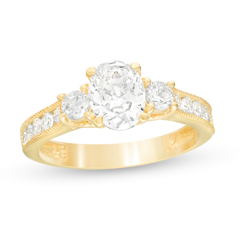 1-3/4 CT. T.W. Oval and Round Diamond Three Stone Engagement Ring in 14K Gold