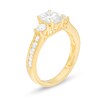 1-3/4 CT. T.W. Oval and Round Diamond Three Stone Engagement Ring in 14K Gold