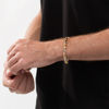 Thumbnail Image 1 of Made in Italy Men's 5.75mm Oval Link Chain Double Circle Station Bracelet in 10K Two-Tone Gold - 8.5"