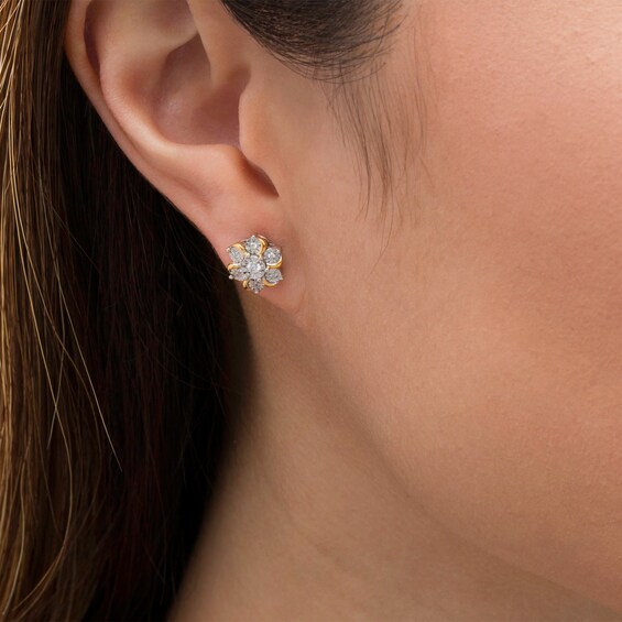 1/10 CT. T.w. Diamond Curved Flower Stud Earrings in Sterling Silver and 14K Gold Plate