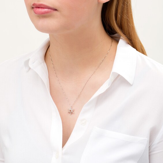 1/8 CT. T.w. Diamond Sun Pendant in 10K White Gold