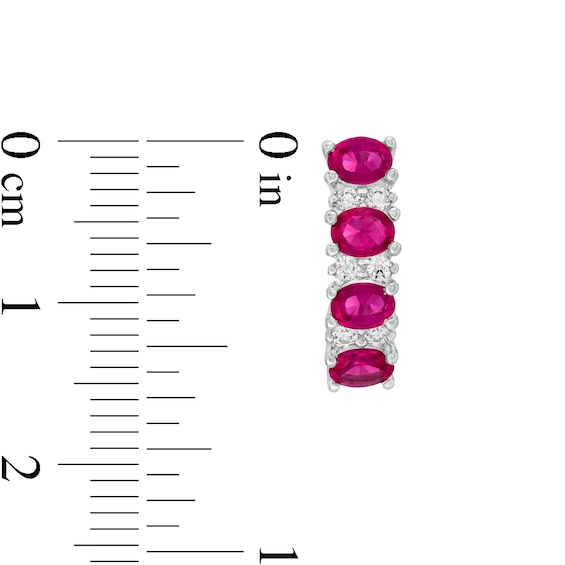 Sideways Oval Ruby and 1/4 CT. T.w. Diamond Duo Alternating Four Stone Hoop Earrings in 14K White Gold