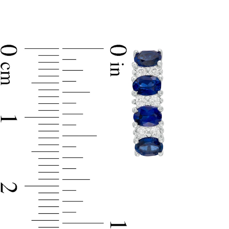 Main Image 3 of Sideways Oval Blue Sapphire and 1/4 CT. T.W. Diamond Duo Alternating Four Stone Hoop Earrings in 14K White Gold