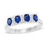 Thumbnail Image 0 of Oval Blue Sapphire and 1/10 CT. T.W. Diamond Duo Alternating Four Stone Ring in 14K White Gold