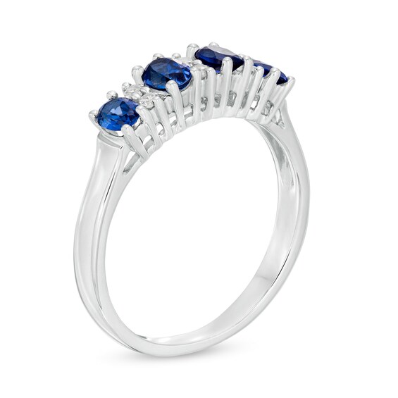 Oval Blue Sapphire and 1/10 CT. T.w. Diamond Duo Alternating Four Stone Ring in 14K White Gold