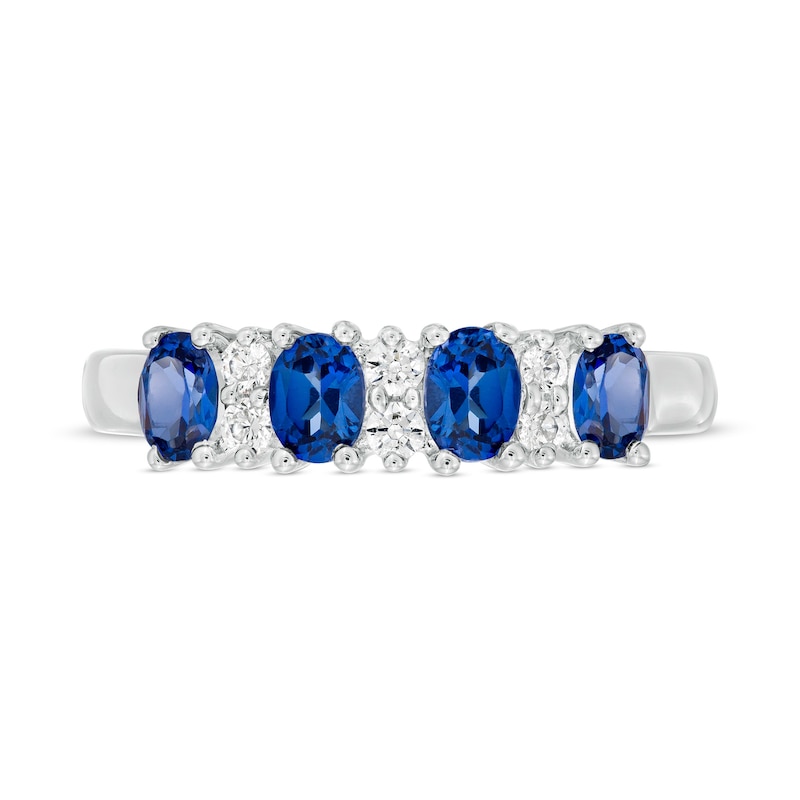 Oval Blue Sapphire and 1/10 CT. T.W. Diamond Duo Alternating Four Stone Ring in 14K White Gold