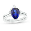 Thumbnail Image 0 of Pear-Shaped Lab-Created Blue Sapphire, White Topaz and 1/20 CT. T.W. Diamond Crown Bridal Set in 10K White Gold