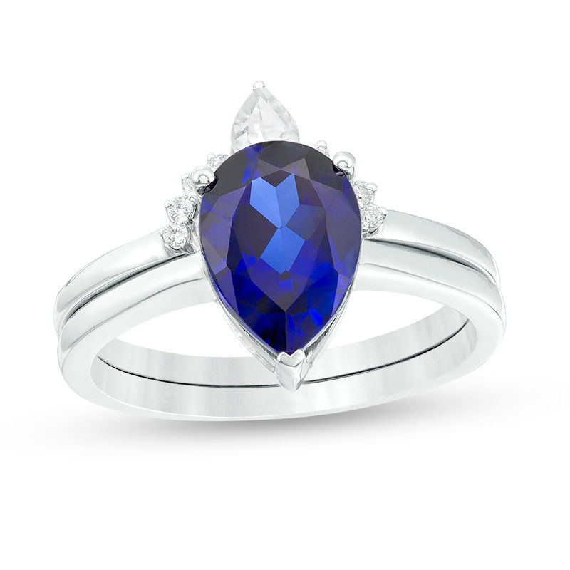 Pear-Shaped Lab-Created Blue Sapphire, White Topaz and 1/20 CT. T.W. Diamond Crown Bridal Set in 10K White Gold