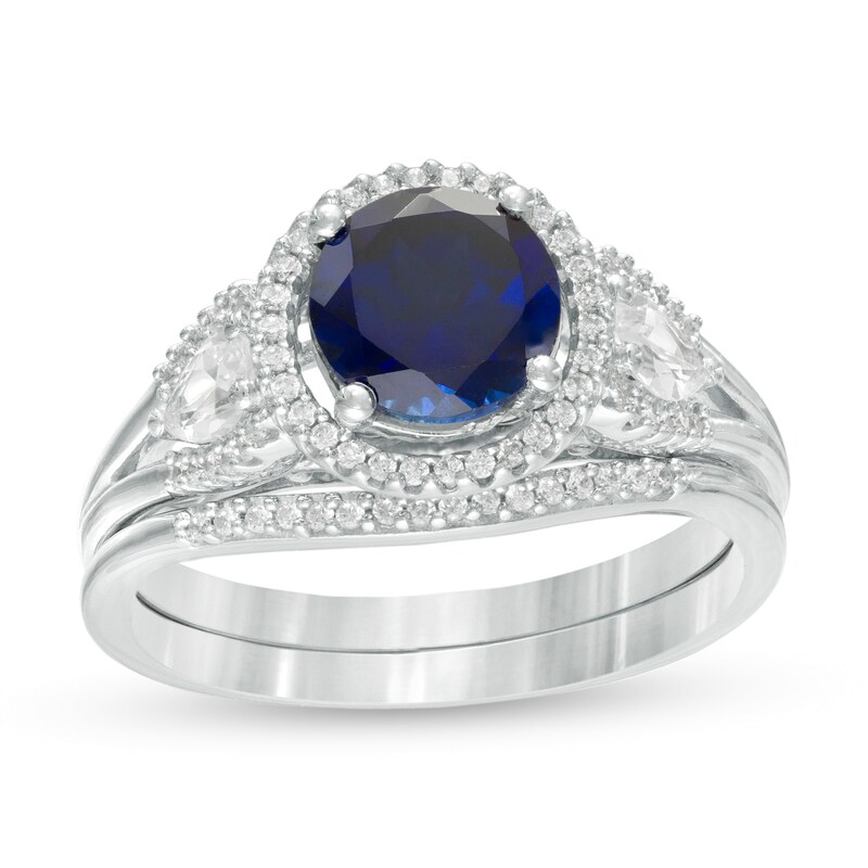 Main Image 1 of 7.0mm Lab-Created Blue and White Sapphire and 1/4 CT. T.W. Diamond Frame Three Stone Bridal Set in Sterling Silver