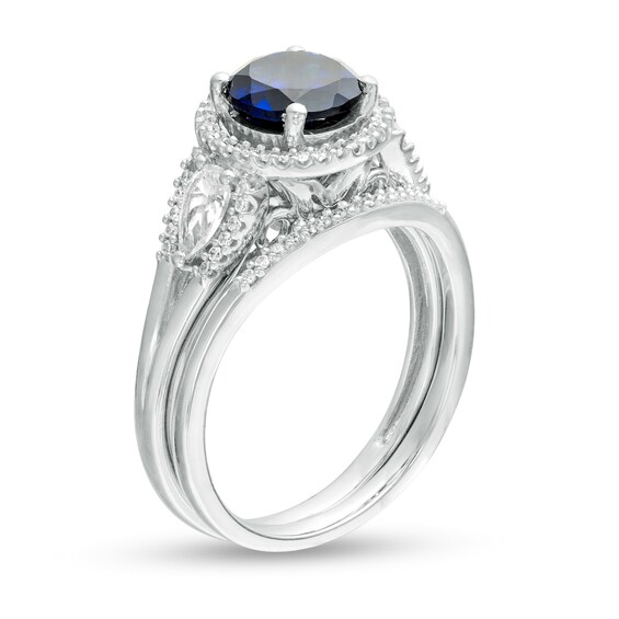 7.0mm Lab-Created Blue and White Sapphire and 1/4 CT. T.w. Diamond Frame Three Stone Bridal Set in Sterling Silver