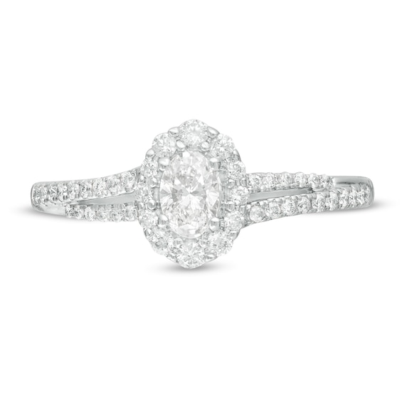 1/2 CT. T.w. Oval Diamond Frame Split Shank Engagement Ring in 10K White Gold