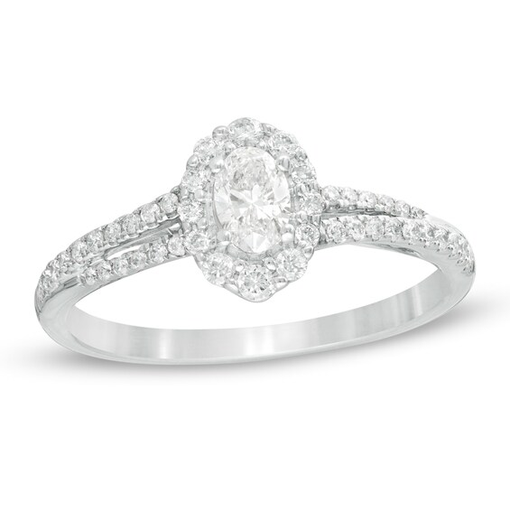 1/2 CT. T.w. Oval Diamond Frame Split Shank Engagement Ring in 10K White Gold