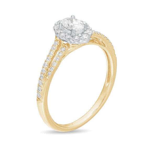 1/2 CT. T.w. Oval Diamond Frame Split Shank Engagement Ring in 10K Gold
