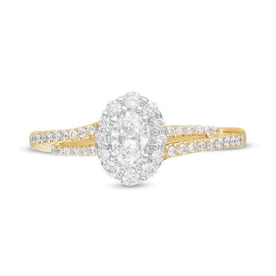 1/2 CT. T.w. Oval Diamond Frame Split Shank Engagement Ring in 10K Gold