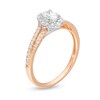 1/2 CT. T.W. Oval Diamond Frame Split Shank Engagement Ring in 10K Rose Gold