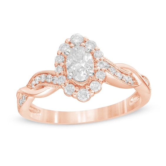 3/4 CT. T.w. Oval Diamond Frame Twist Shank Vintage-Style Engagement Ring in 10K Rose Gold