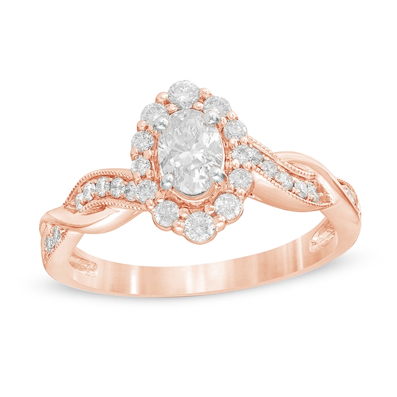 3/4 CT. T.W. Oval Diamond Frame Twist Shank Vintage-Style Engagement Ring in 10K Rose Gold