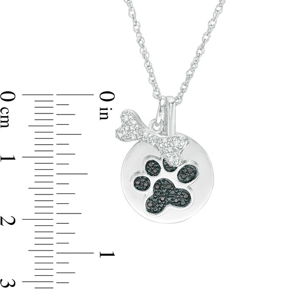 1/10 CT. T.w. Enhanced Black and White Diamond Bone and Paw Print Disc Charm Pendant in Sterling Silver