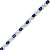 Thumbnail Image 0 of Oval Lab-Created Blue Sapphire and 1/4 CT. T.W. Diamond Double Infinity Bracelet in Sterling Silver - 7.25"