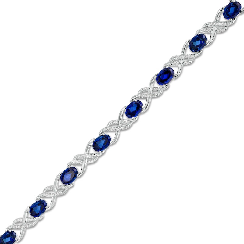 Oval Lab-Created Blue Sapphire and 1/4 CT. T.W. Diamond Double Infinity Bracelet in Sterling Silver - 7.25"