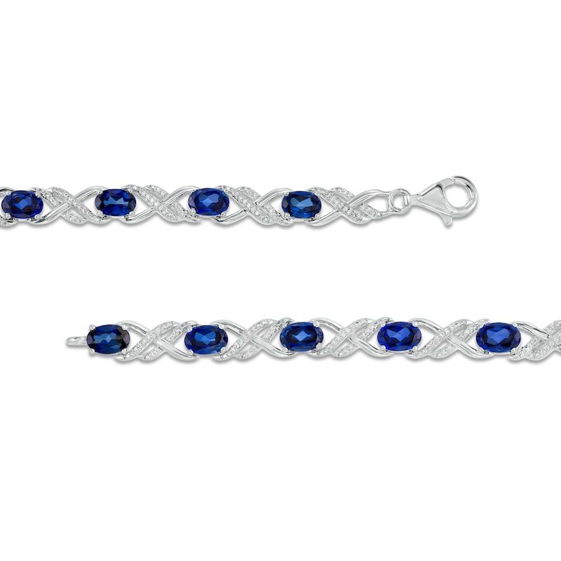 Oval Lab-Created Blue Sapphire and 1/4 CT. T.W. Diamond Double Infinity Bracelet in Sterling Silver - 7.25"