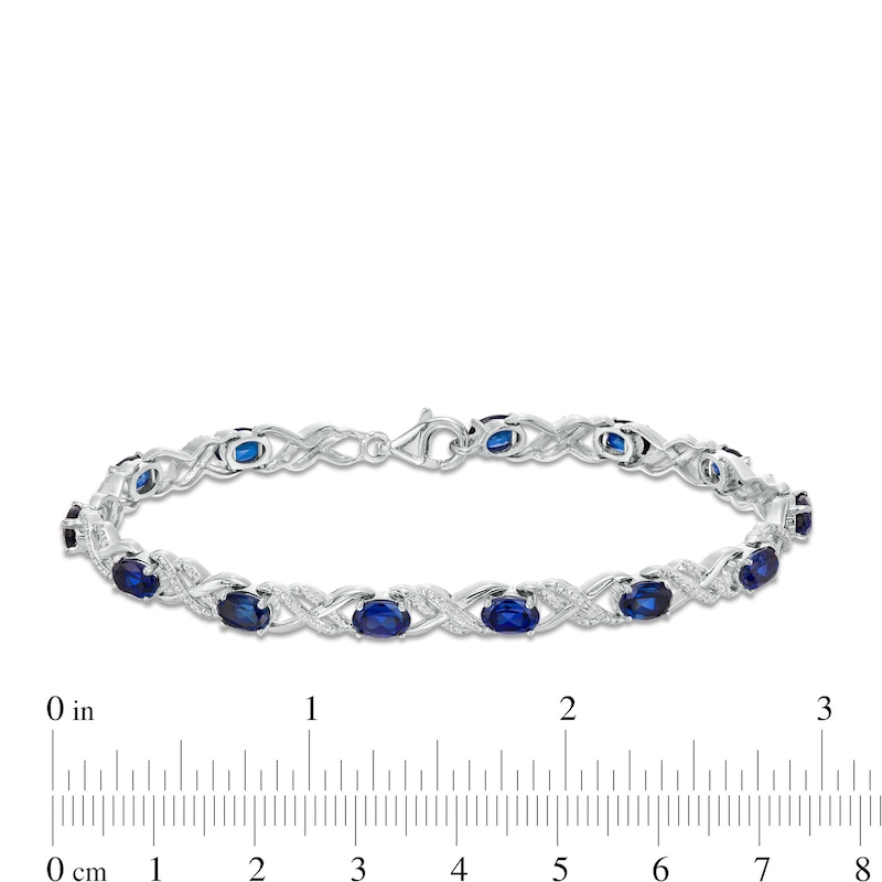 Oval Lab-Created Blue Sapphire and 1/4 CT. T.W. Diamond Double Infinity Bracelet in Sterling Silver - 7.25"