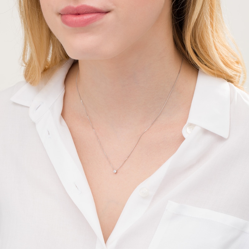 Main Image 2 of 1/10 CT. Diamond Solitaire Pendant in 14K White Gold