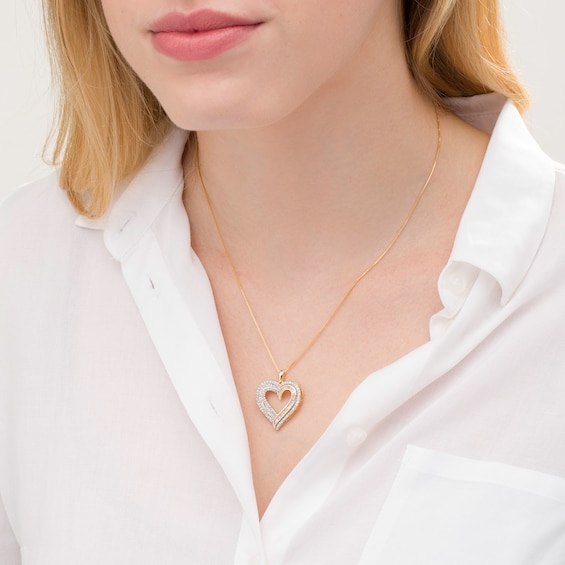 1 CT. T.w. Baguette and Round Diamond Double Row Heart Pendant in 10K Gold