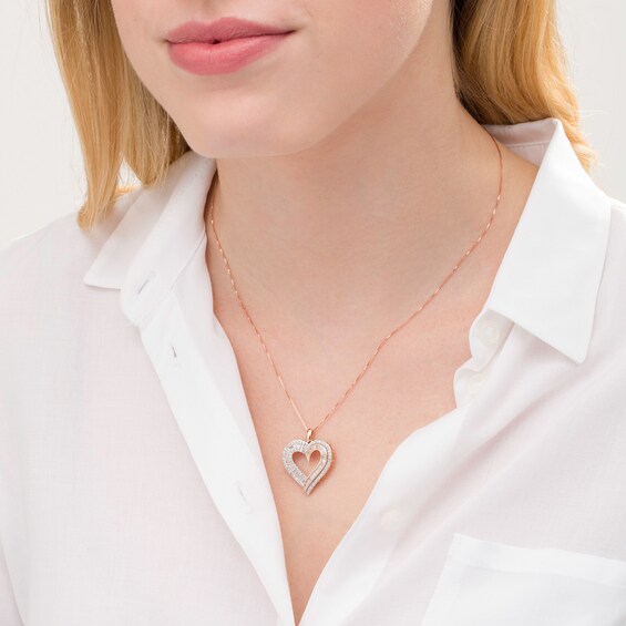 1 CT. T.w. Baguette and Round Diamond Double Row Heart Pendant in 10K Rose Gold
