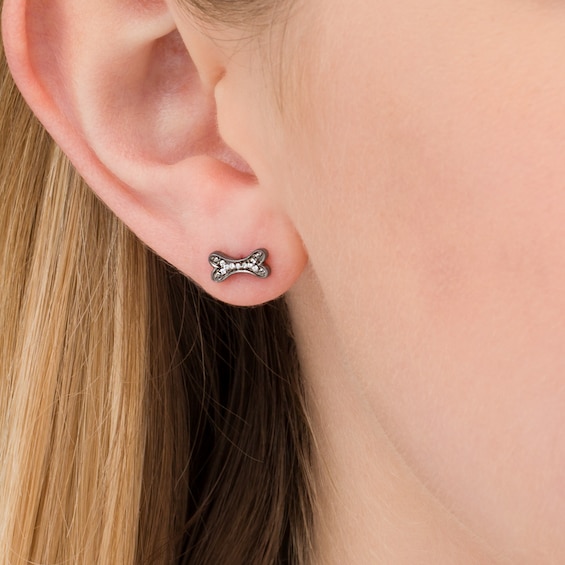 1/20 CT. T.w. Enhanced Black and White Diamond Bone and Paw Mismatch Stud Earrings in Sterling Silver with Black Rhodium