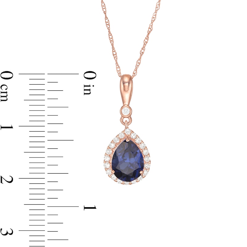 Main Image 3 of Pear-Shaped Lab-Created Blue Sapphire and 1/10 CT. T.W. Diamond Frame Pendant in 10K Rose Gold