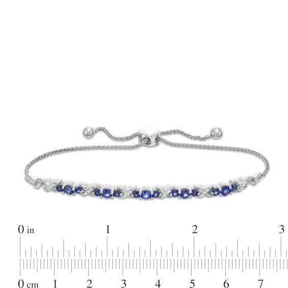 Lab-Created Blue Sapphire and 1/15 CT. T.w. Diamond Three Stone "X" and "O" Bolo Bracelet in Sterling Silver - 9.5"