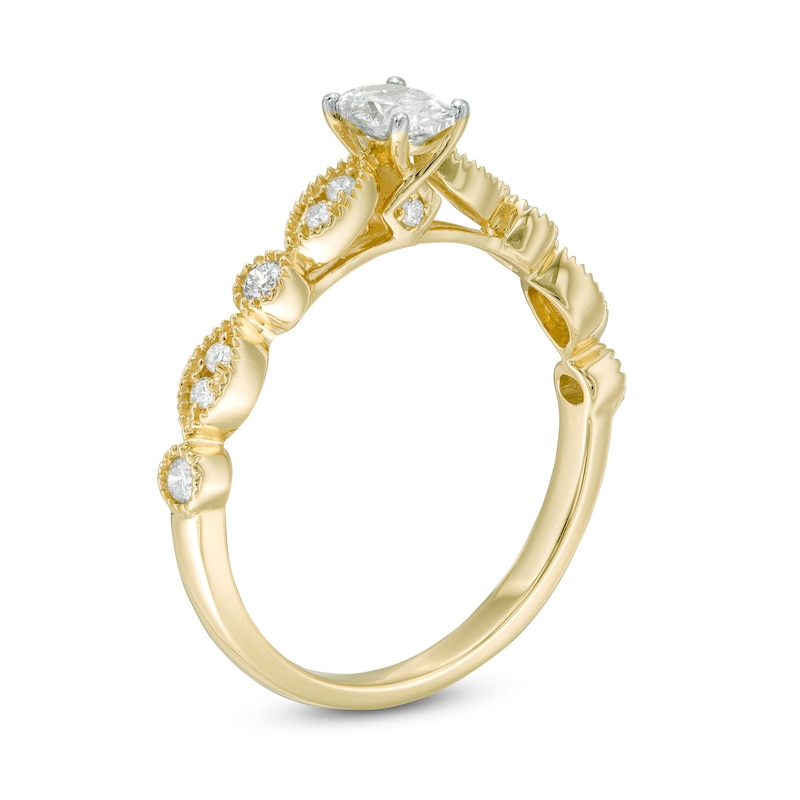 1/2 CT. T.W. Oval Diamond with Marquise Shapes Vintage-Style Engagement Ring in 10K Gold