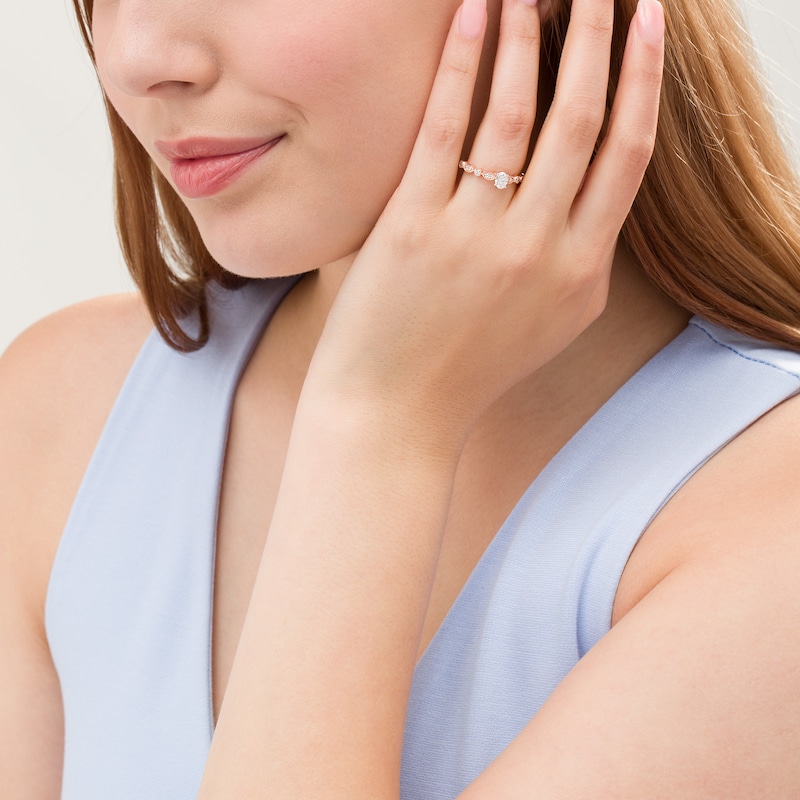 Main Image 2 of 1/2 CT. T.W. Oval Diamond with Marquise Shapes Vintage-Style Engagement Ring in 10K Rose Gold