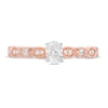 1/2 CT. T.W. Oval Diamond with Marquise Shapes Vintage-Style Engagement Ring in 10K Rose Gold