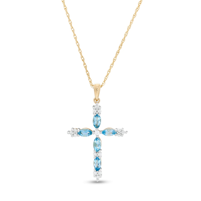 Main Image 1 of Marquise Swiss Blue Topaz and 1/15 CT. T.W. Diamond Cross Pendant in 10K Gold