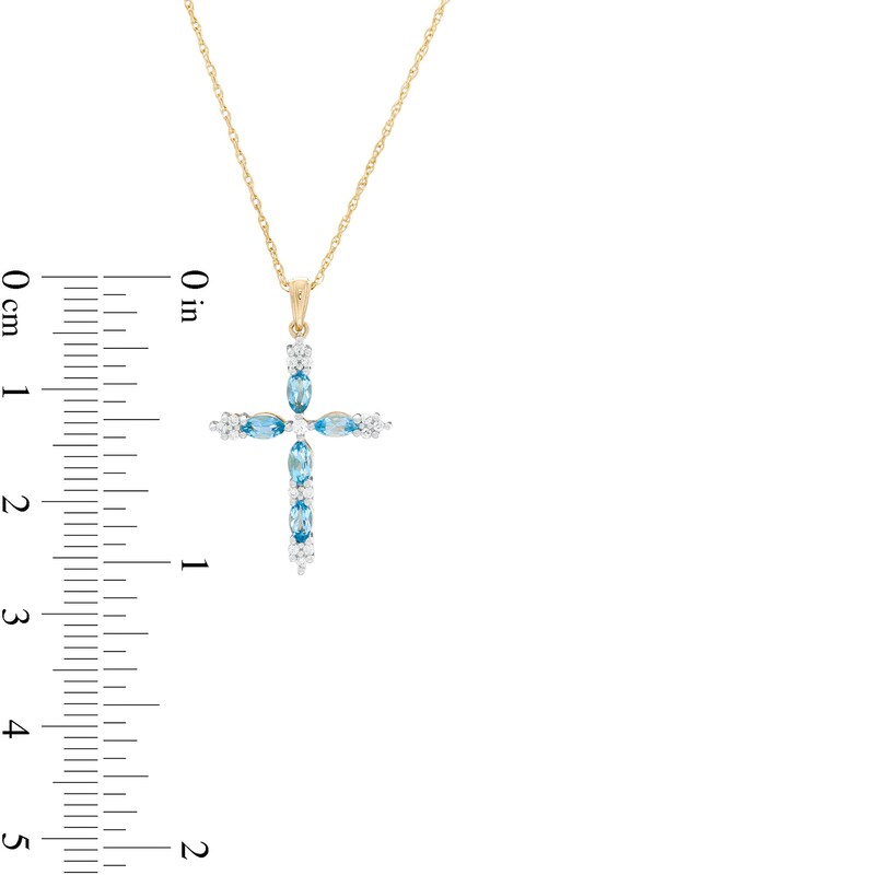 Main Image 2 of Marquise Swiss Blue Topaz and 1/15 CT. T.W. Diamond Cross Pendant in 10K Gold
