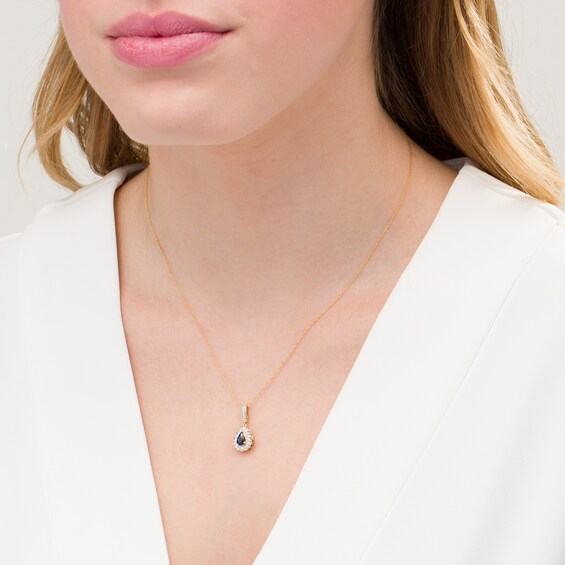 Pear-Shaped Blue Sapphire and 1/6 CT. T.W. Diamond Scallop Frame Vintage-Style Pendant in 10K Gold Pear-Shaped Blue Sapphire and 1/6 CT. T.W. Diamond Scallop Frame Vintage-Style Pendant in 10K Gold