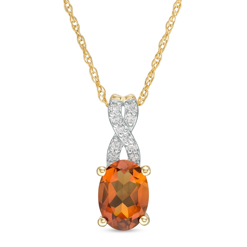 Main Image 1 of Oval Madeira Citrine and 1/20 CT. T.W. Diamond "X" Drop Pendant in 10K Gold
