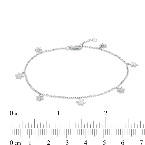 1/20 CT. T.w. Diamond Alternating Star Charm Bracelet in 10K White Gold - 7.5"