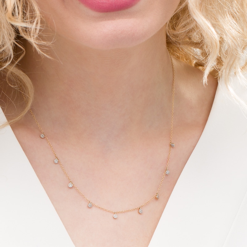 Main Image 2 of 1/8 CT. T.W. Diamond Dangle Station Necklace in 10K Gold